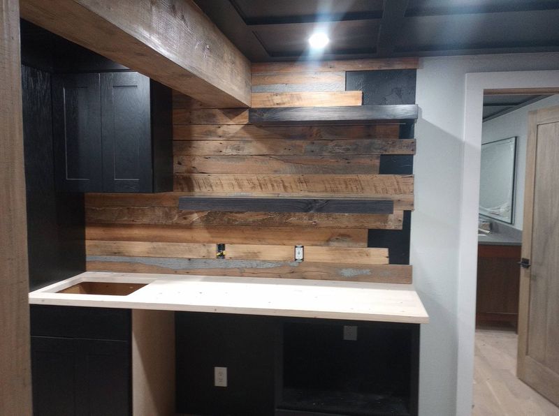 Rustic Elegance: A Room Remodel Featuring Custom Wood Paneling & Cabinetry by Eggert Construction and Landhaus Woodworks