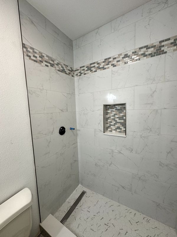 Modern Bathroom Remodel by D&J Custom Floors