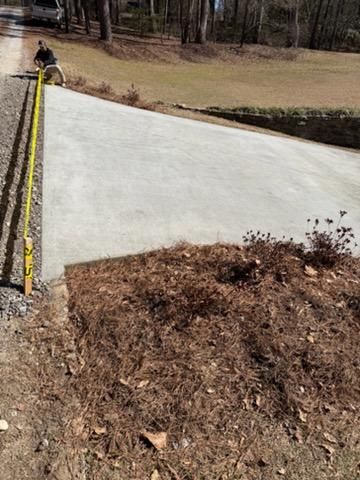 Sleek Driveway Transformation: Elevating Your Northport Home's Curb Appeal with Precision Concrete Work