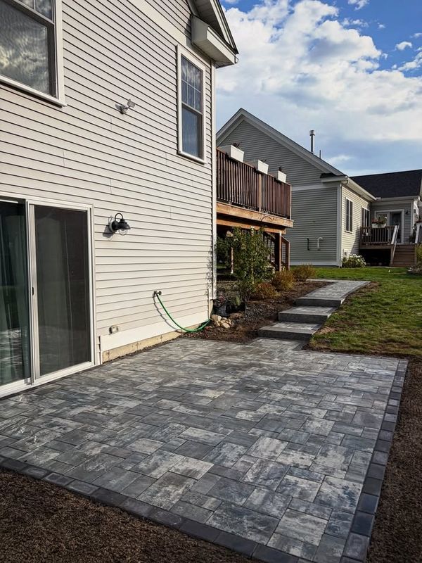 Elegance Underfoot: Becker Stone & Design's Exquisite Hardscape Transformation