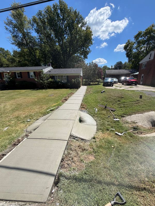 Concrete Sidewalk with Culvert Pipe installation