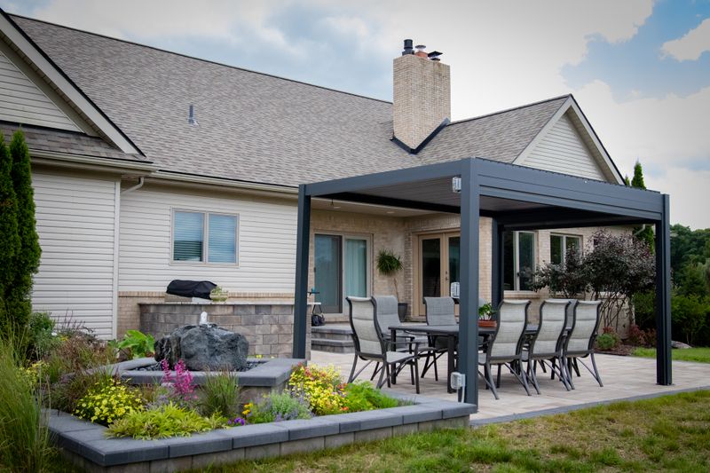 Superior Oasis: Transformative Retreat with Custom Water Feature and Elegant Outdoor Dining Space