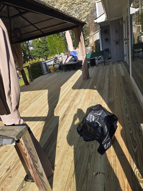 "Transforming Outdoor Spaces in Marietta: Premier Fence's Deck Revamp Mastery"