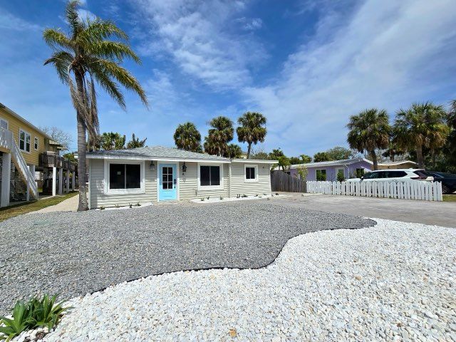 Seaside Serenity: Transformative Hardscaping with Granite, Marble, and Family-Friendly Features in Indian Rocks Beach
