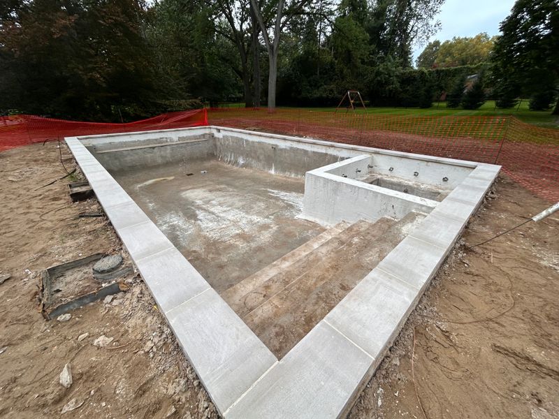 Elegant Limestone Pool Coping Installation in Bloomfield Hills