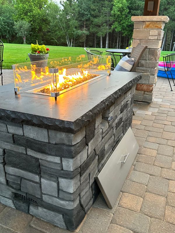 Outdoor kitchen and living spaces.