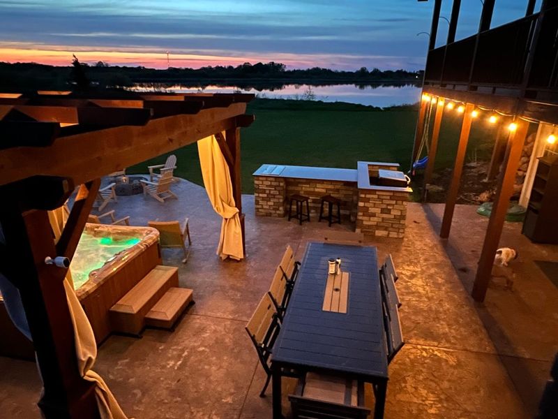 Outdoor kitchen and living spaces.