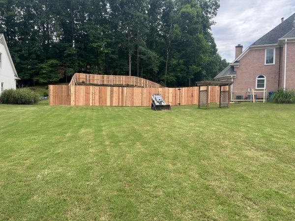 Reinforced Elegance in Arlington: Patriot Fence's Cedar and Steel Masterpiece