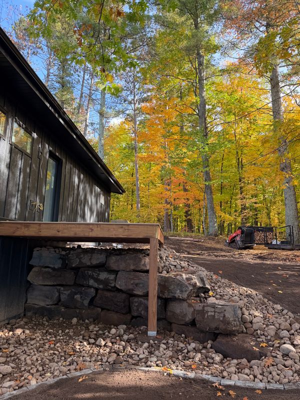 Elevated Elegance: Rock Walls and Edging Masterpiece