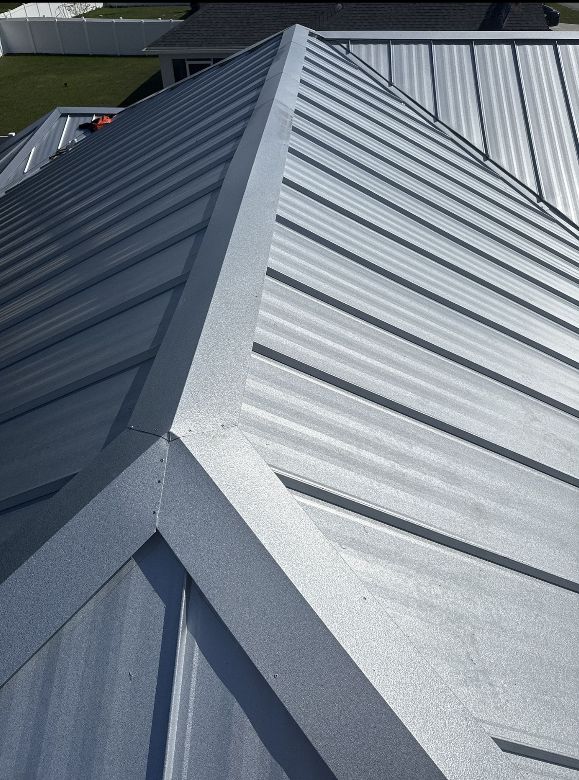 Durable Elegance: Transforming Homes with Premium Metal Roofing by Ridgecap Roofing