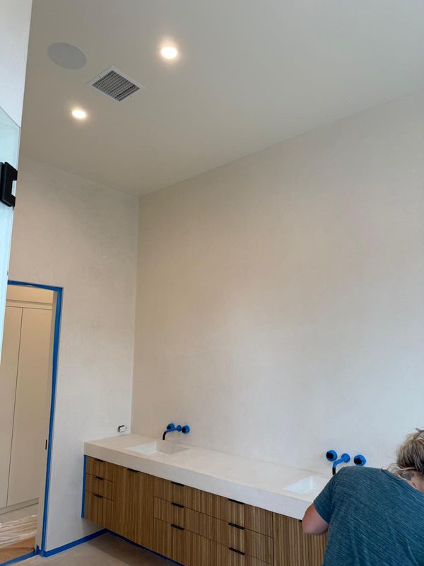 White micro cement shower walls