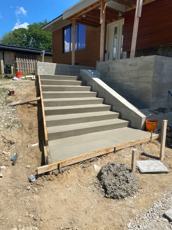 Concrete entry steps and landing