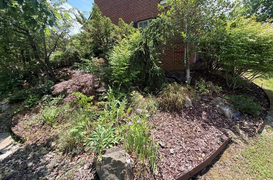 Garden beds refreshed with mulch