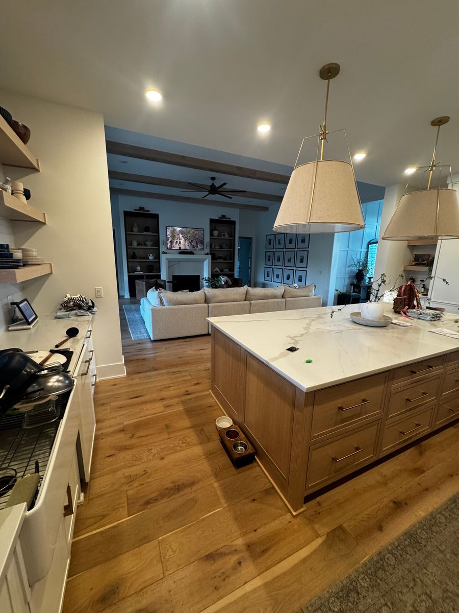 Open kitchen with a large island after a clean