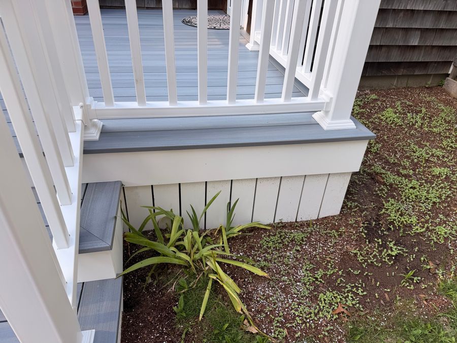 White porch railing and trim repainted