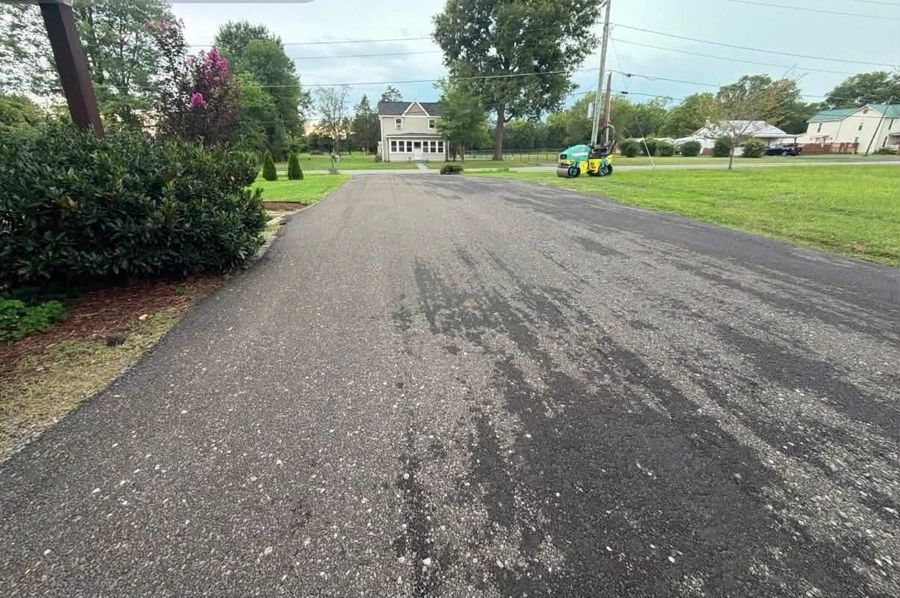 Finished millings driveway in front of a house