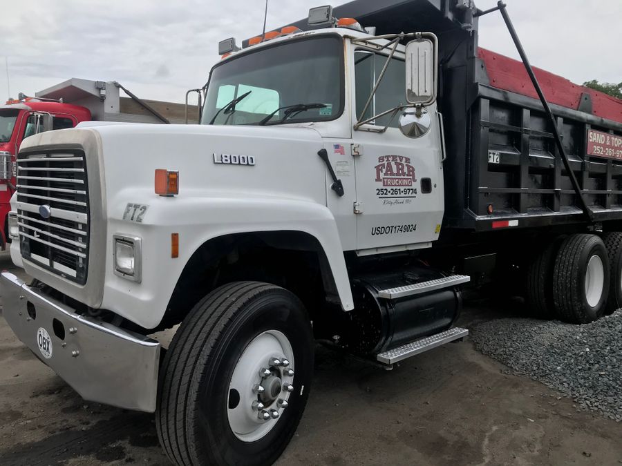 White Farr Trucking Ford L8000 dump truck FT2 with a red-topped bed