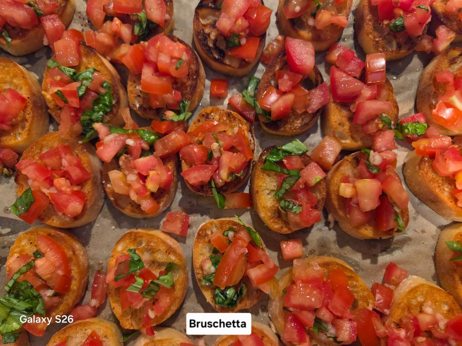 Bruschetta topped with diced tomato and basil