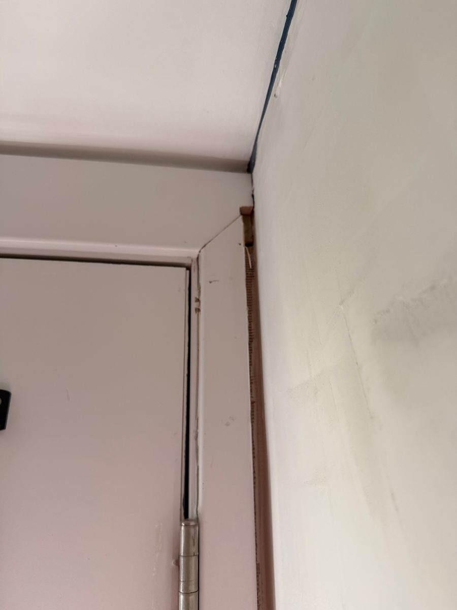 Wall patch sanded smooth before paint