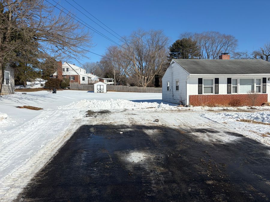 Freshly plowed driveway after a storm