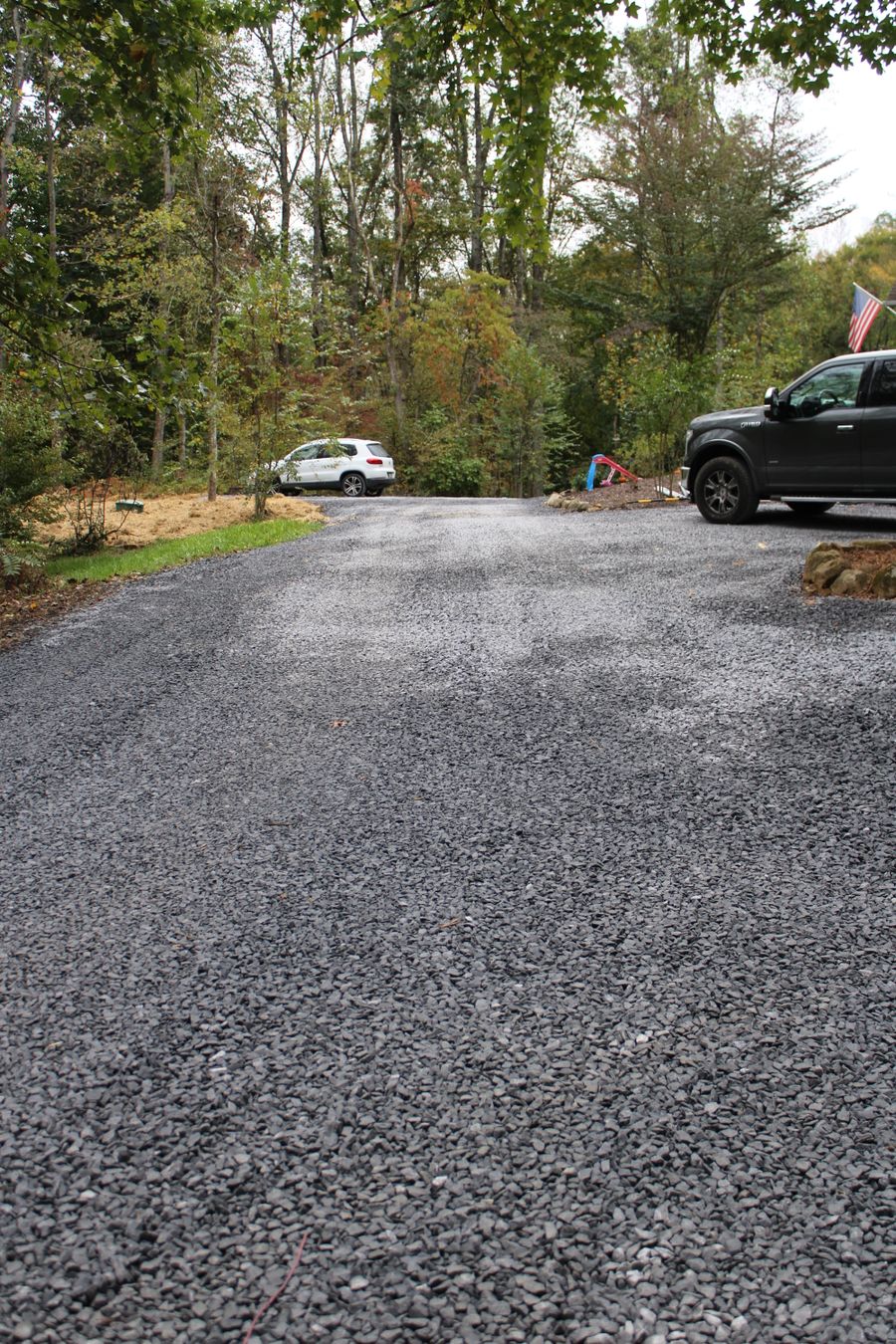 Graded driveway with a truck parked at the top