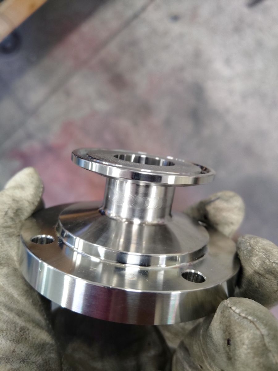 Tri-Clamp ferrule welded to a bolt flange with stacked TIG beads
