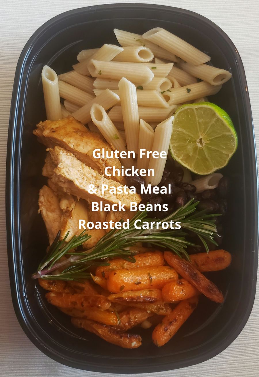 Gluten free chicken and pasta meal with black beans and roasted carrots