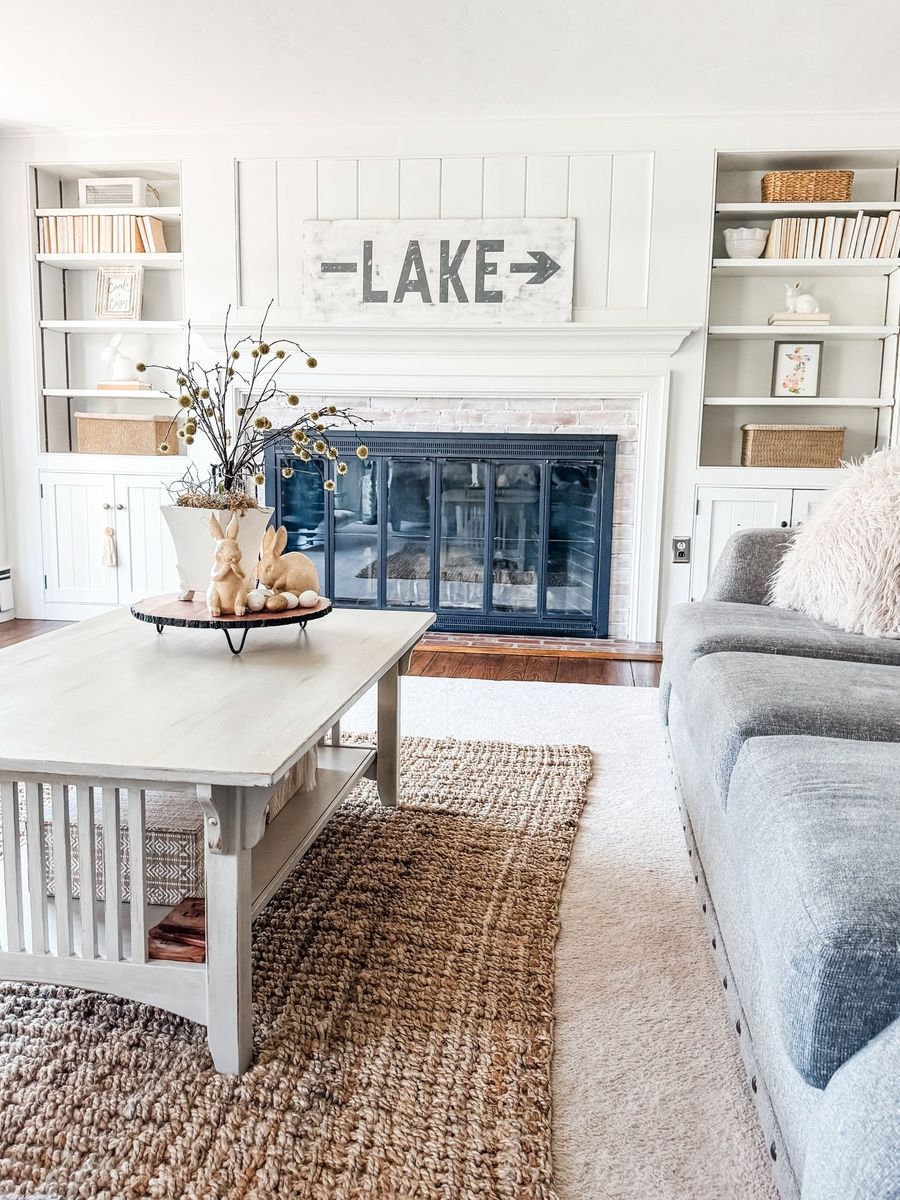 Lakeside living room with white shiplap and built-ins