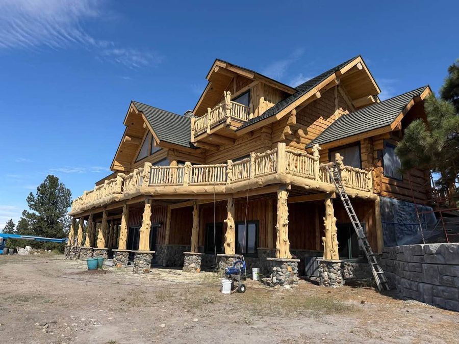 Lift work on a two-storey log home