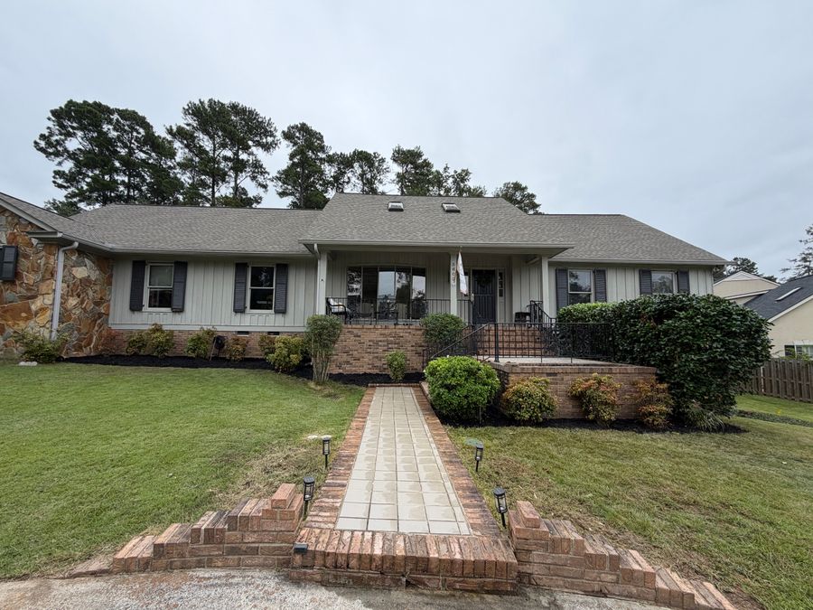 Front walkway lined with landscape beds, finished by Ascend Outdoors in Evans, GA