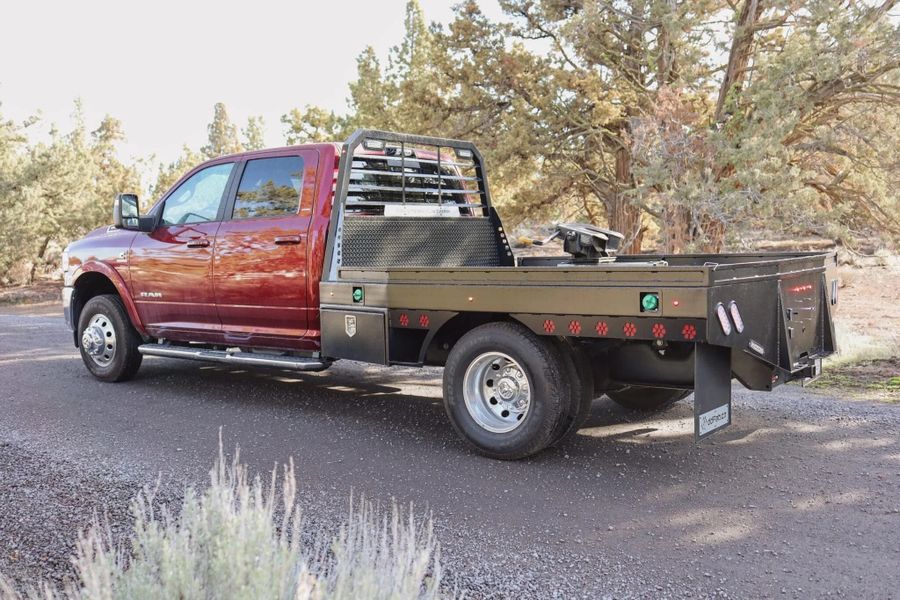 Double Diamond flatbed with a 5th wheel setup on a Dodge 3500