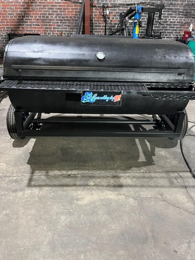 Custom pig cooker with the Lyons Welding Shop plate