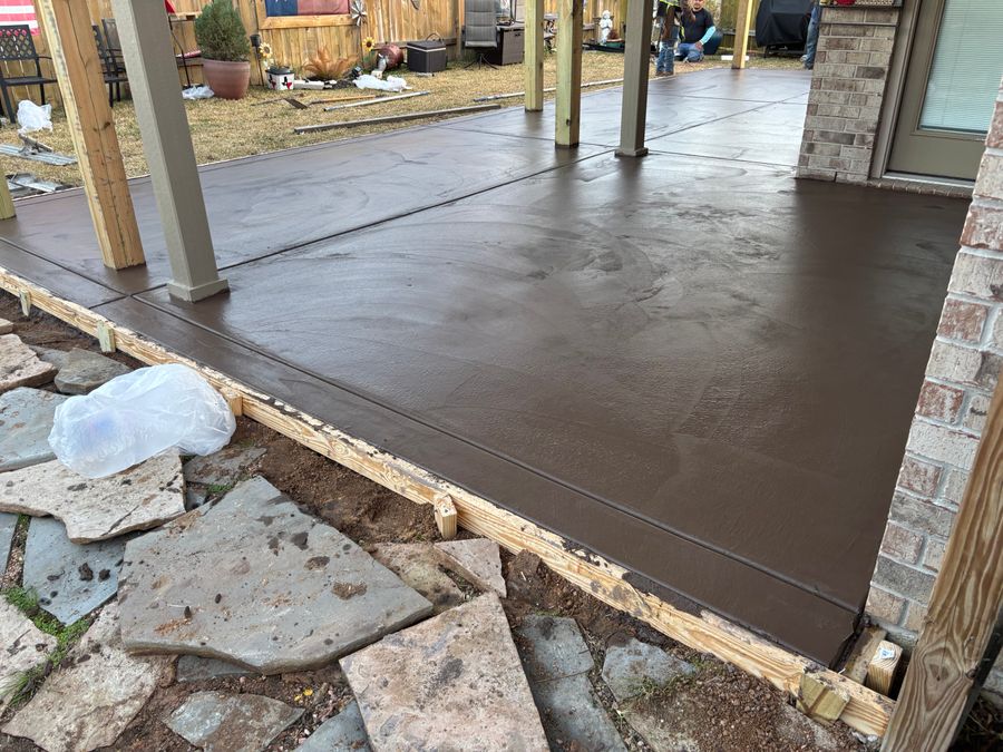 Covered porch slab poured off the back of a house