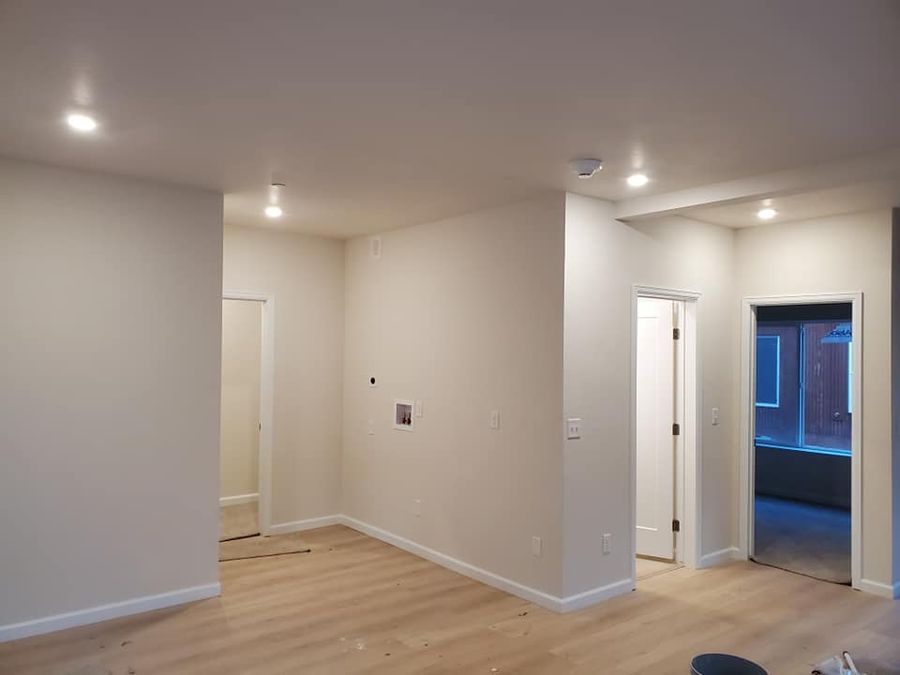 Bright painted rooms with a wood floor