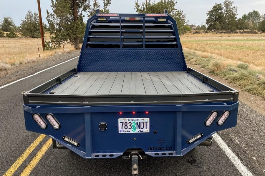 Rear view of a Double Diamond flatbed with a Trex deck