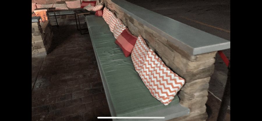 Outdoor bar counter with bench seating