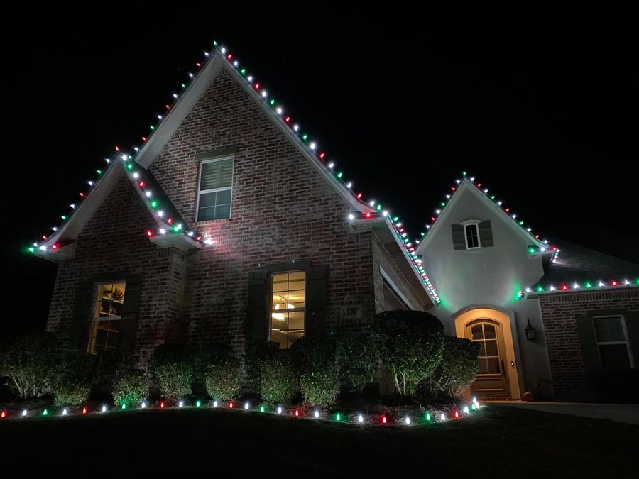 Brick gables outlined in multicolor lights