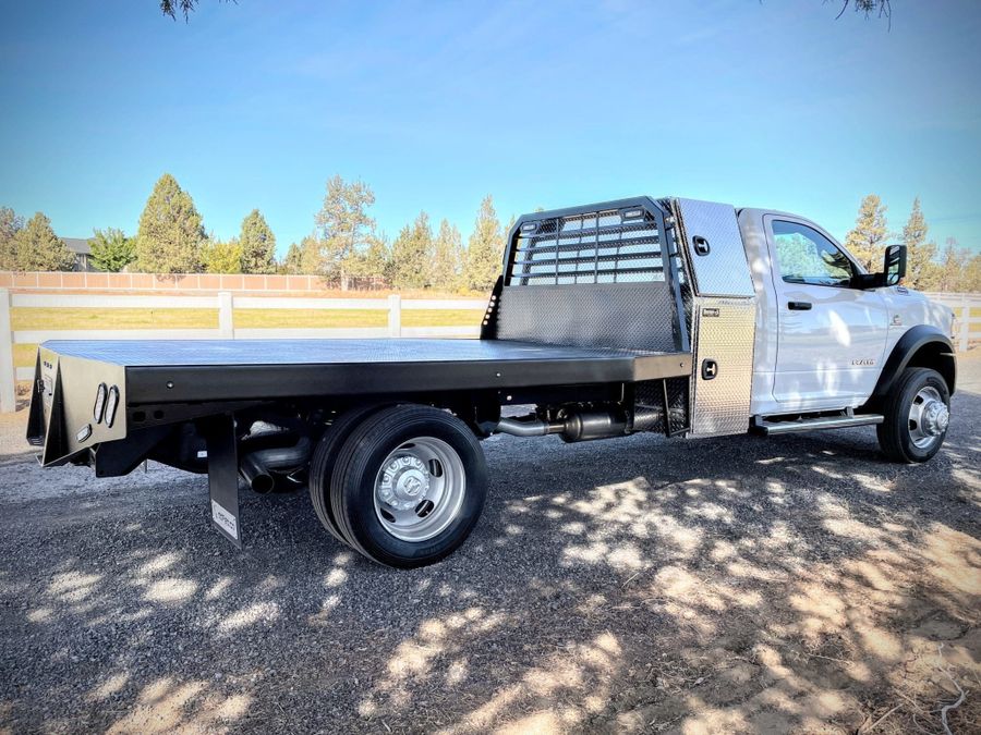 Double Diamond steel deck flatbed on a cab and chassis truck