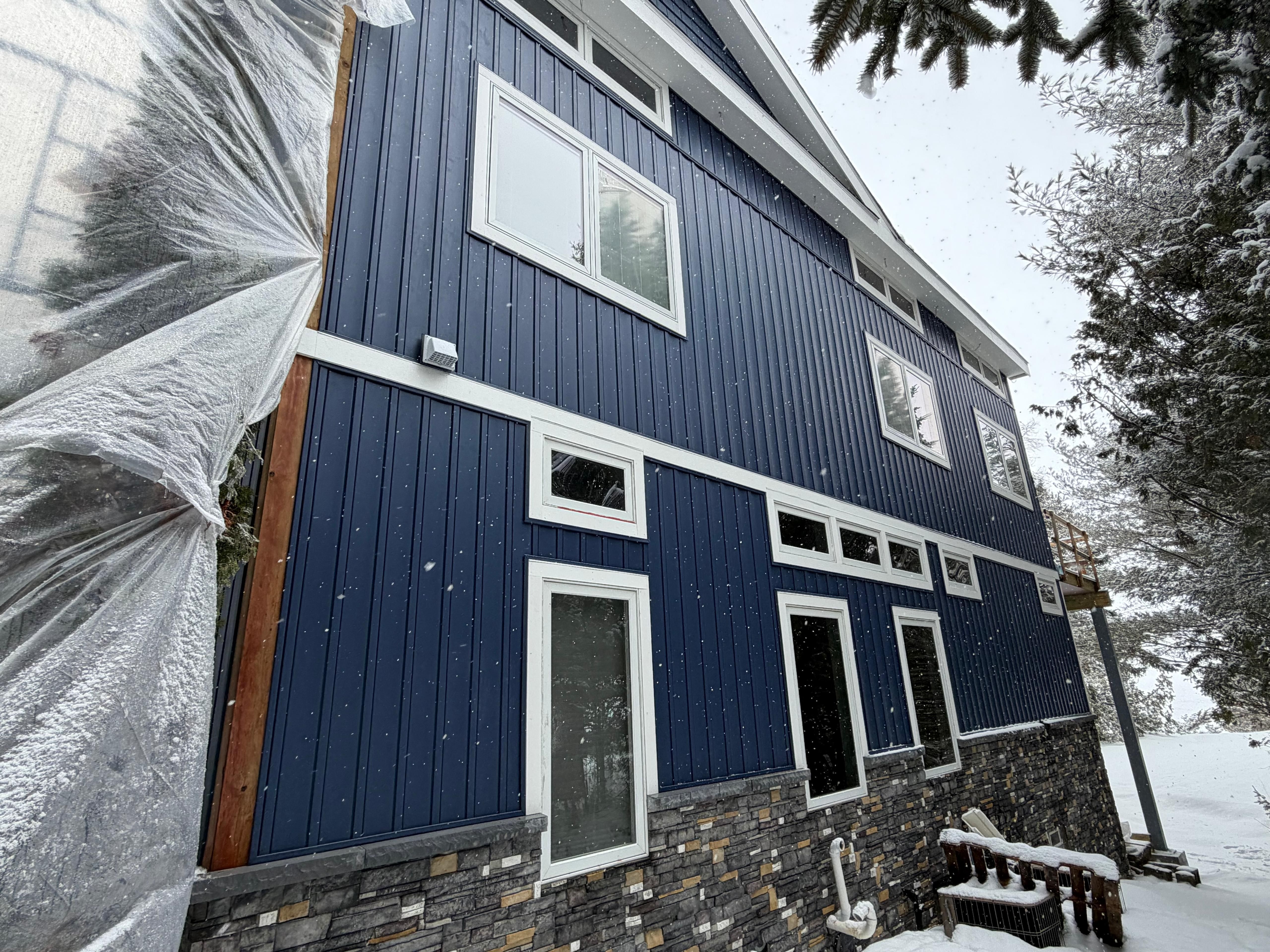  for Deluxe New World Painting Company  in Cheboygan, MI