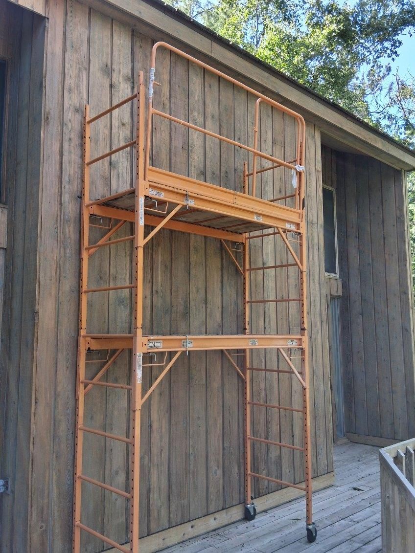  for Deluxe New World Painting Company  in Cheboygan, MI