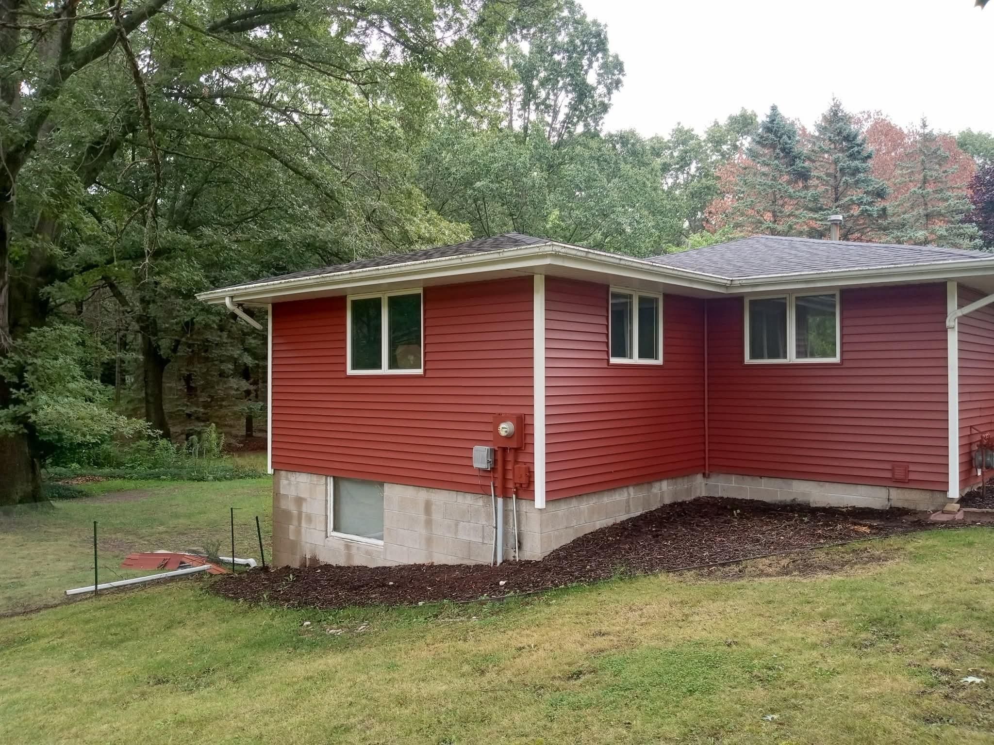 All Photos for Buck's Exteriors in Manistee, MI