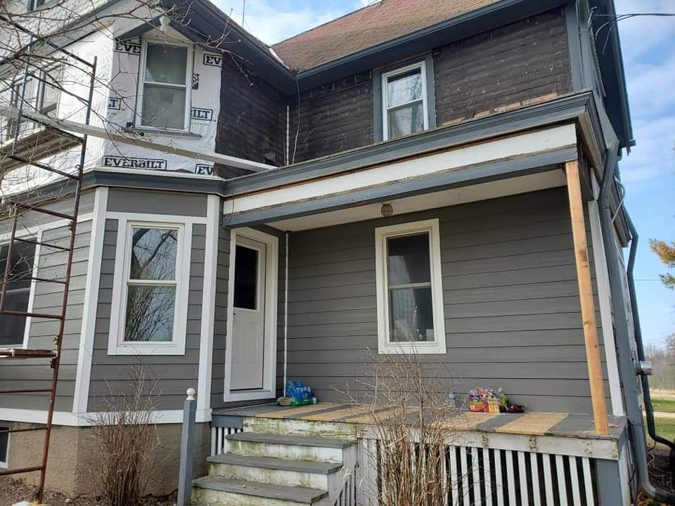  for Custom Quality Exteriors in Saukville, WI