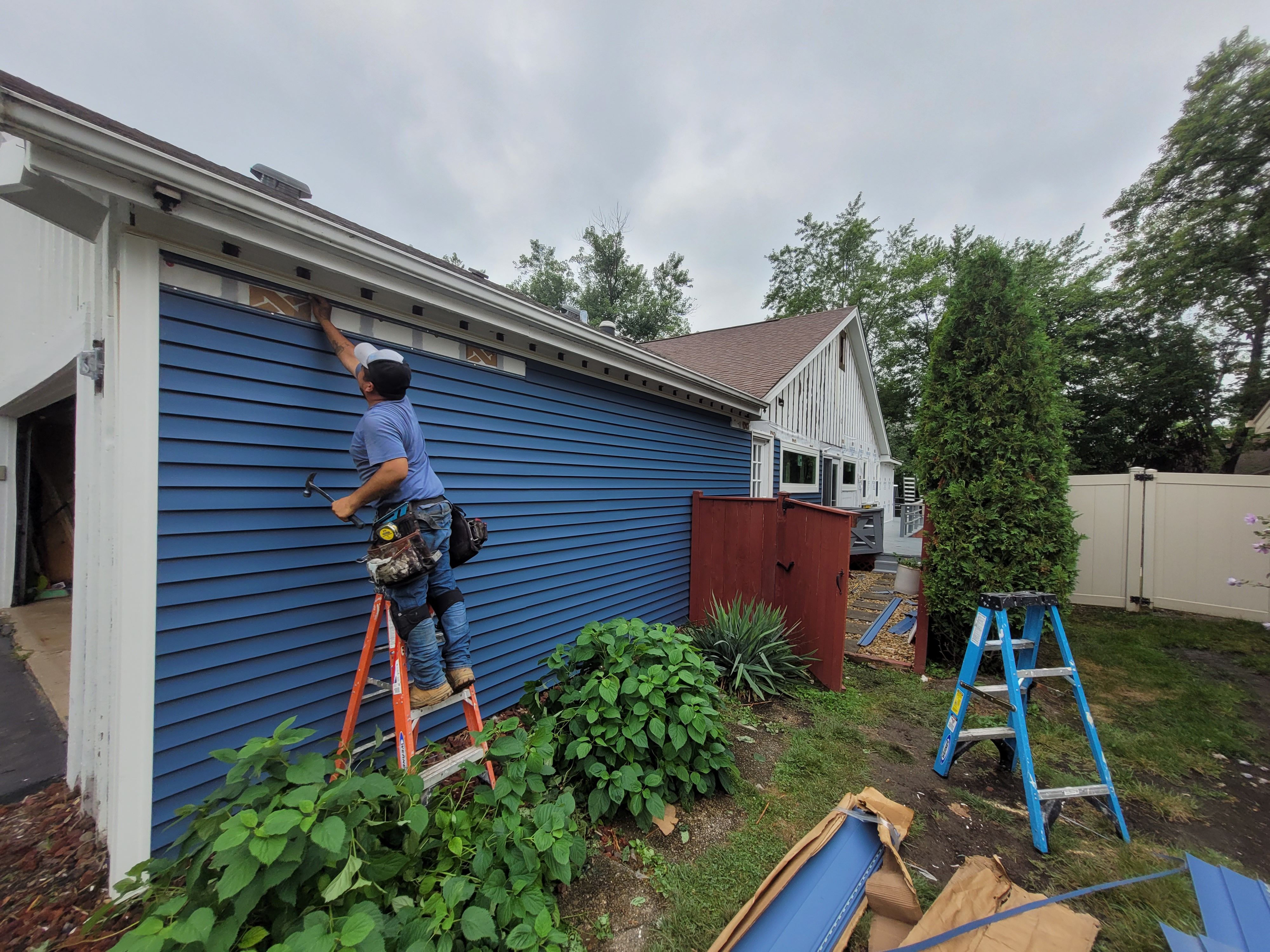 Vinyl siding,windows and gutters  for Go-at Remodeling & Painting in Northbrook,  IL