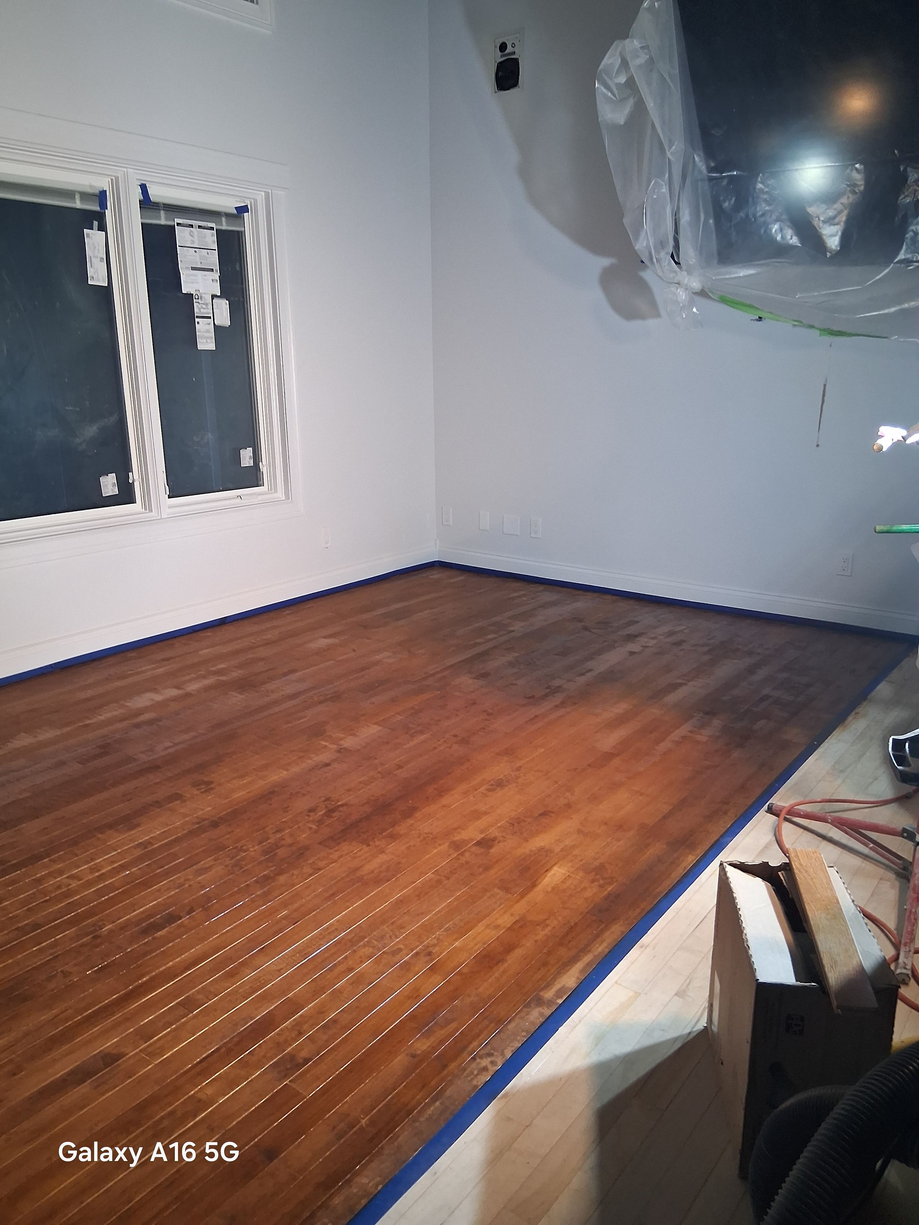  for Deluxe New World Painting Company  in Cheboygan, MI