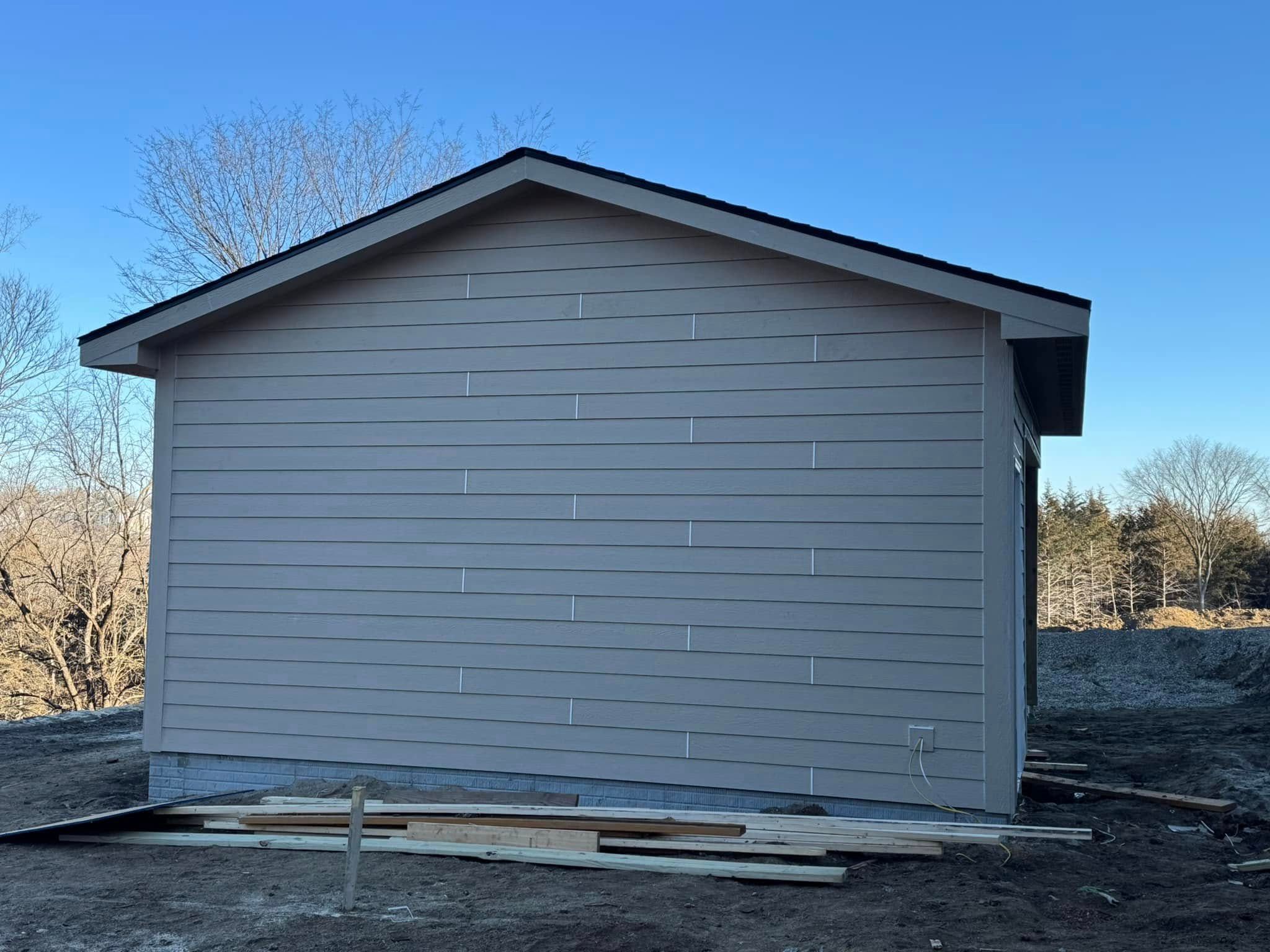  for EM Exteriors in Grimes, IA