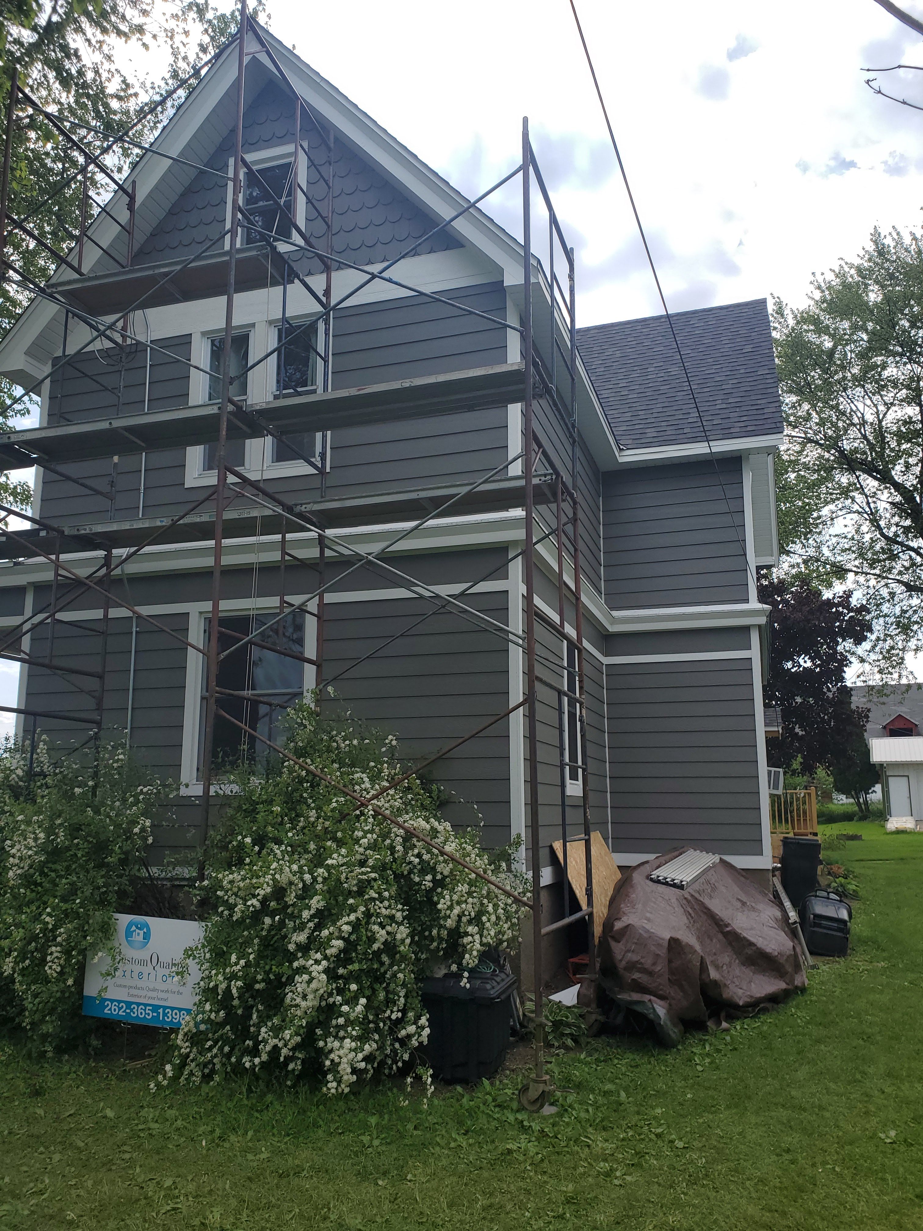  for Custom Quality Exteriors in Saukville, WI
