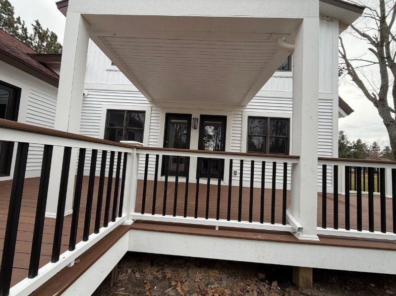  for Deluxe New World Painting Company  in Cheboygan, MI