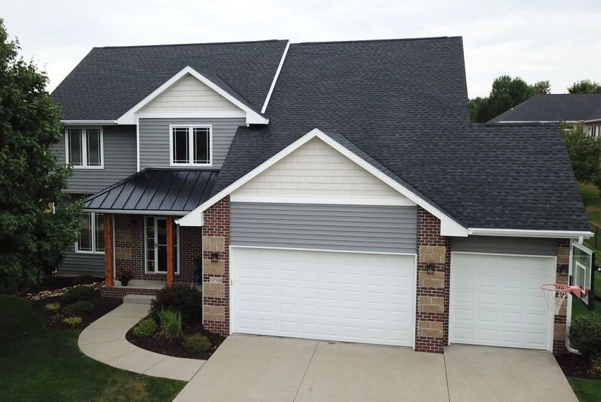  for Genesis Roofing & Construction in Cumming, IA