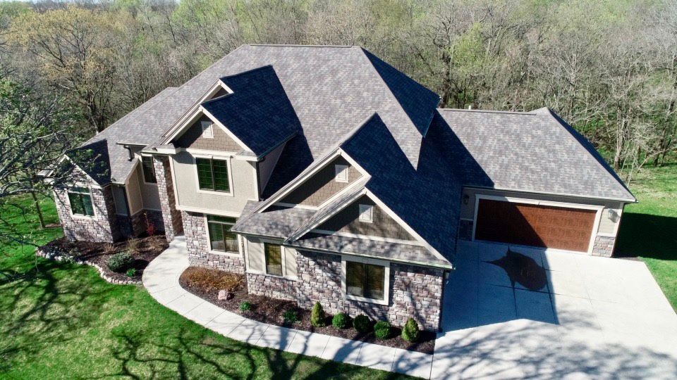  for Genesis Roofing & Construction in Cumming, IA