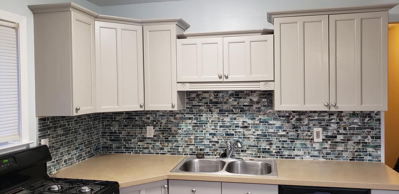 Our kitchen and cabinet refinishing service will completely restore the look of your cabinets at a fraction of the cost of replacement! We use only the highest quality paints and finishes to ensure a lasting transformation. for Joe's Drywall And Painting in Detroit, MI 